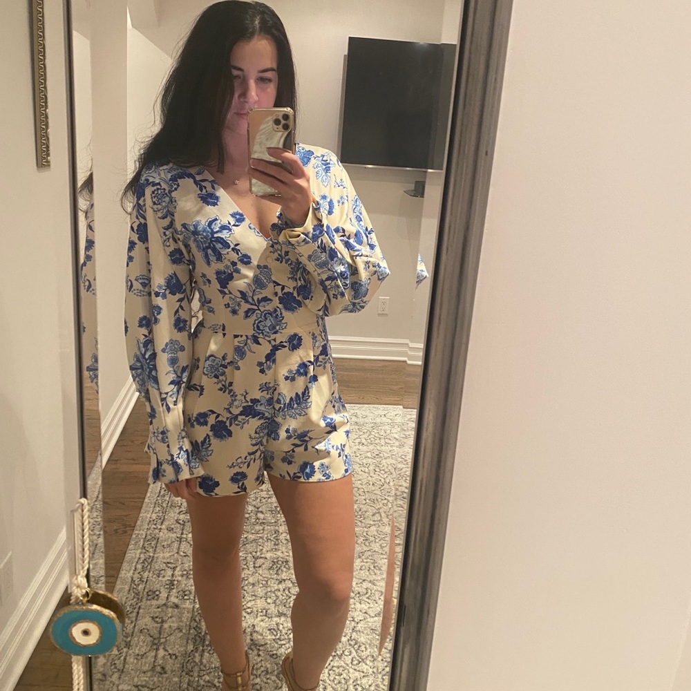 Floral romper with pleated sleeve detailing NWT